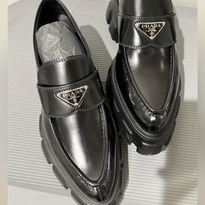 Prada Monolith pointy brushed leather loafers